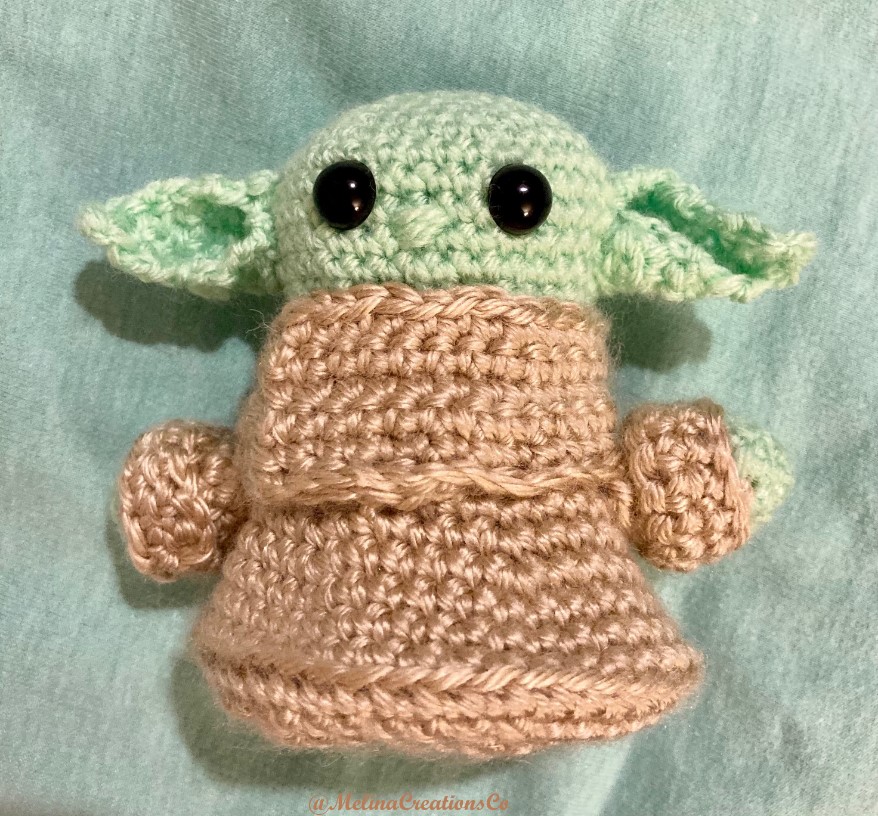 Front of crocheted Baby Yoda