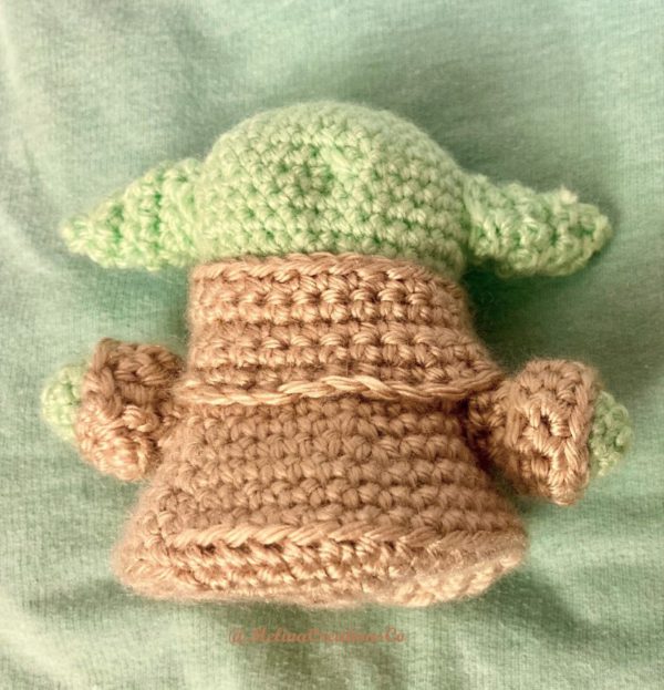 Back of crocheted Baby Yoda
