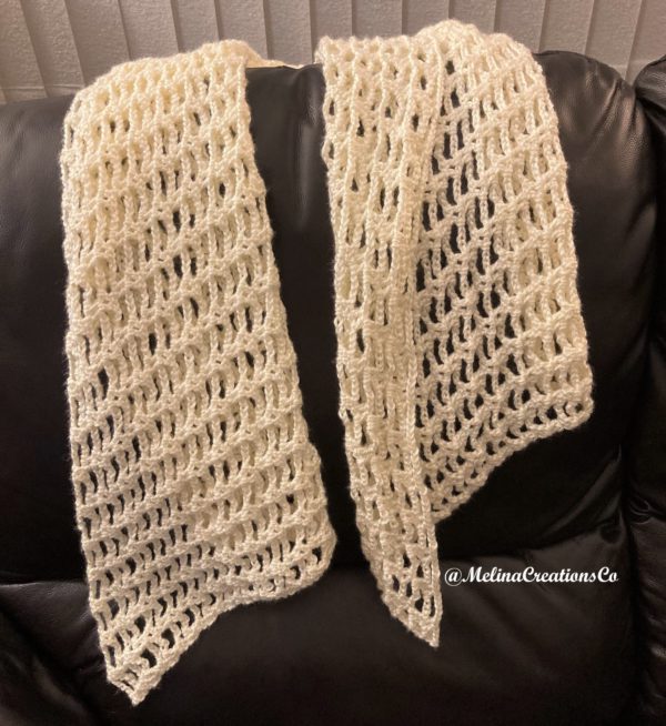 White crochet shawl draped