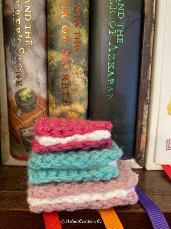 Stack of miniature crochet books