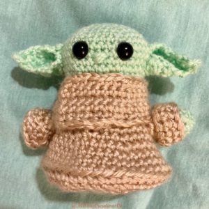 Front of crocheted Baby Yoda